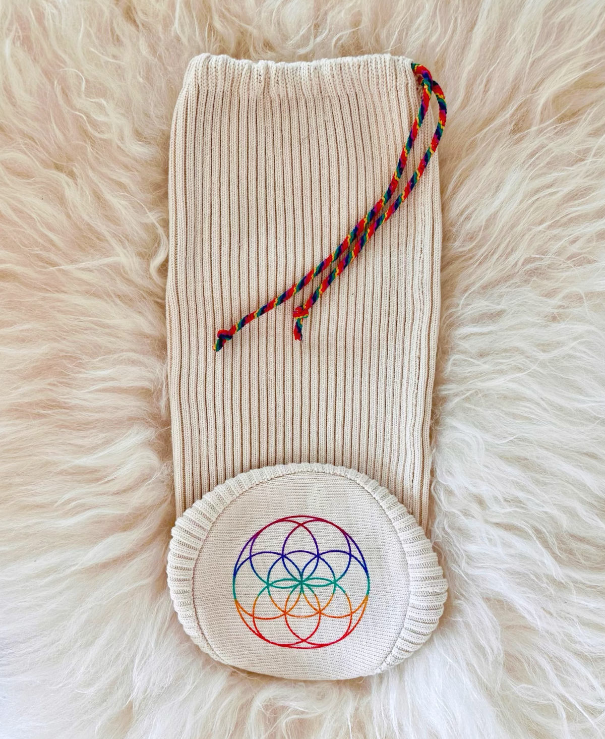 Eco-Luxe organic cotton singing bowl cover with flower of life symbol and chakra drawstring by Harmonic Life