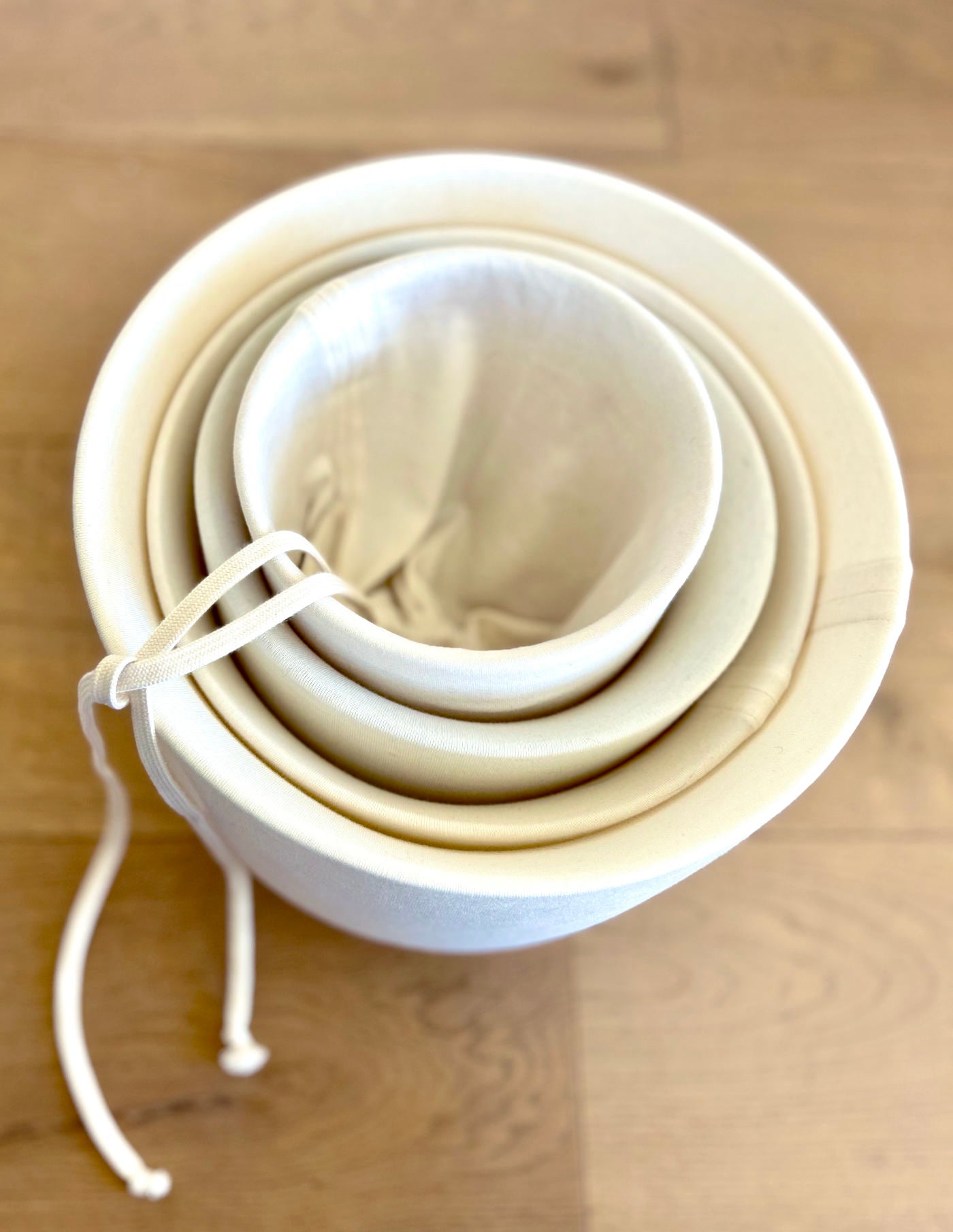 Harmonic Skins in organic silk touch cotton nested together for space saving singing bowl protection